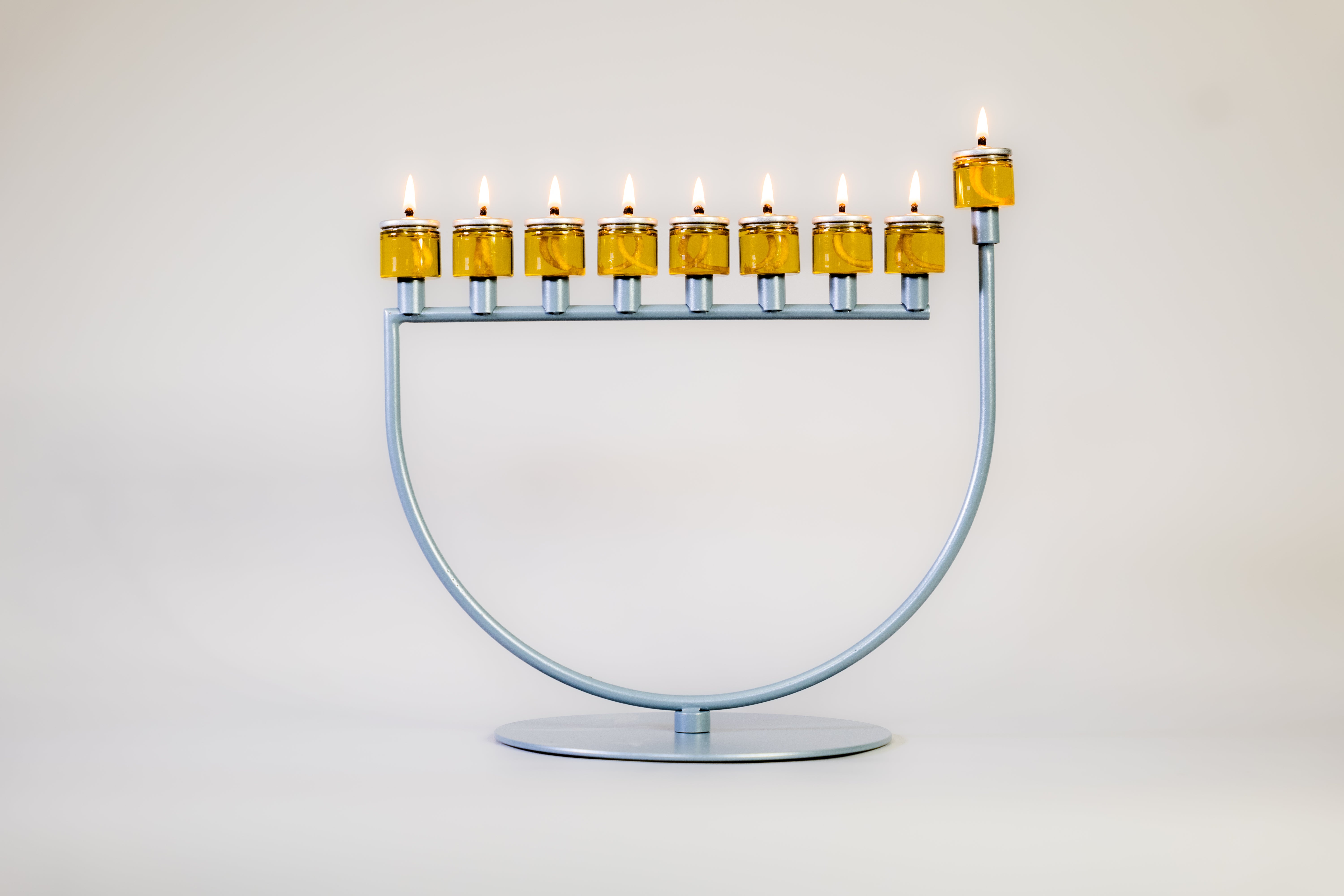 Compass Menorah – Rod & Flame